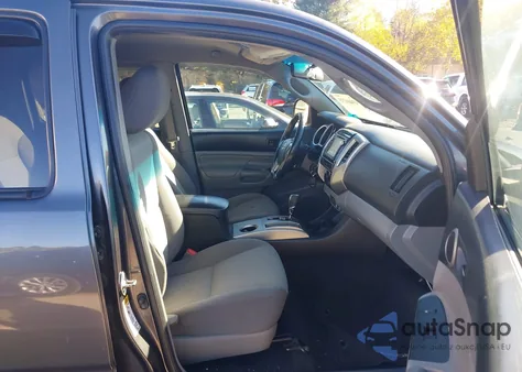 2015 Toyota Tacoma Base V6 z USA, uszkodzony, nr VIN 3TMLU4EN5FM197170